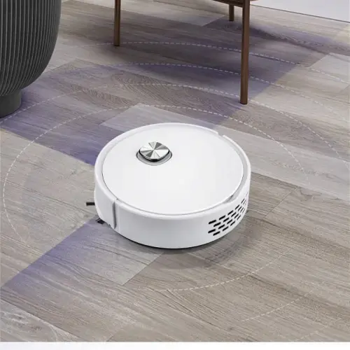 RoboVac X cleaning a hardwood floor around furniture.